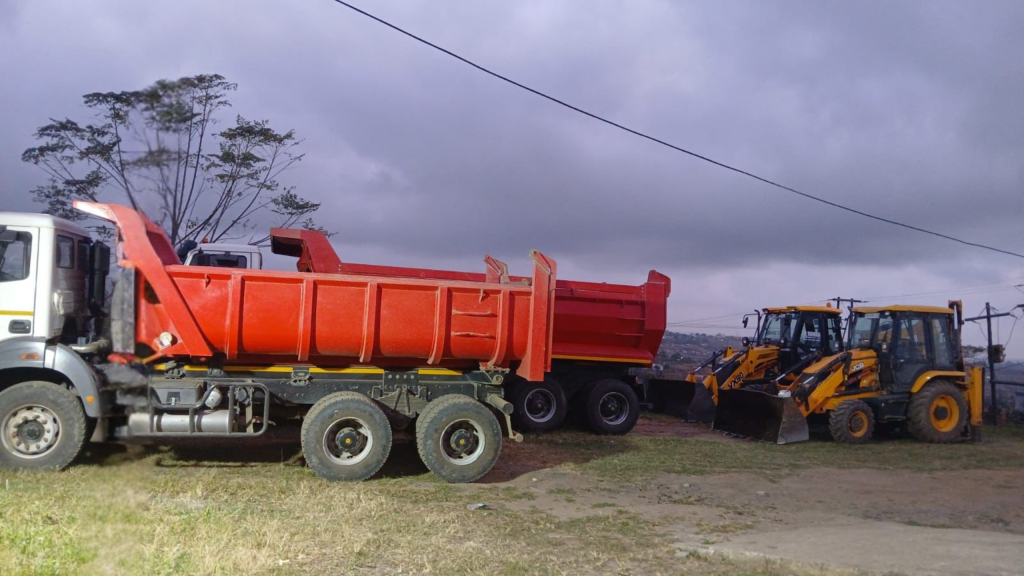 View of a level construction site ready for foundation laying. Groundwork preparation machinery and plant hire service.